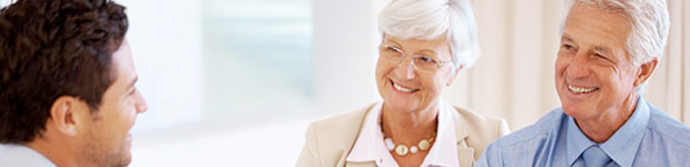 Discuss your estate planning with an attorney at Rooth & Rooth Elder Law Attorneys Elderly couple speaking to Seminole, FL estate planning attorney