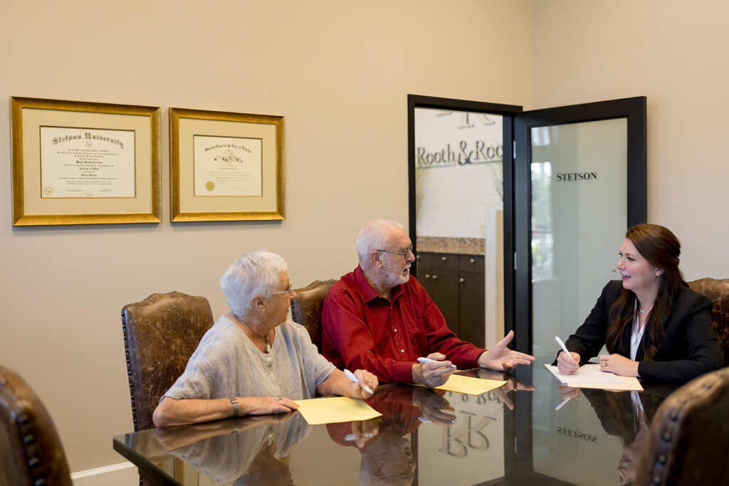Marie Rooth Zorrilla meeting with prospective clients - Rooth & Rooth Elder Law Attorneys